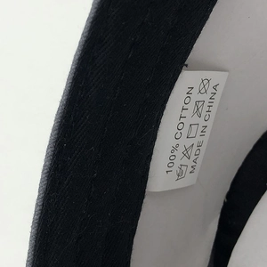 Detail view of the 100% cotton washed military cap showing internal label and fabric
