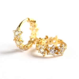 Luxurious gold S925 sterling silver star-shaped huggie earrings with sparkling crystals
