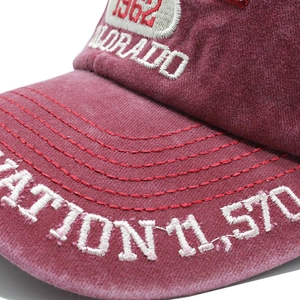 Detail of 1962 Colorado embroidery on washed cotton baseball cap with red stitching