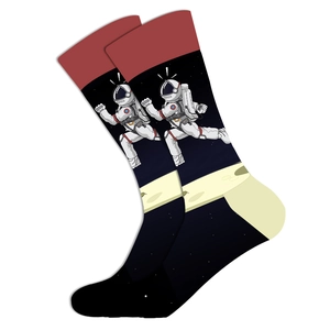 Detail of crew socks featuring astronauts running on moon surface and red ribbed cuffs