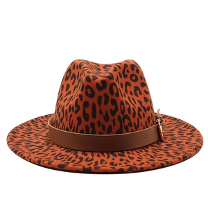Leopard print wool felt fedora hat with brown leather belt buckle on white background