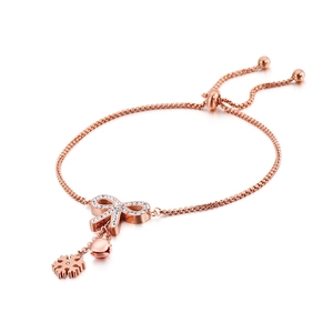 Elegant rose gold butterfly bracelet with crystal snowflake and bell charms, adjustable