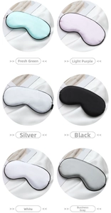 Detail view of adjustable silk sleep masks in green, purple, silver, black, and gray