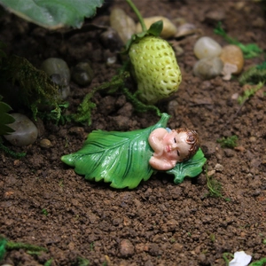 Miniature sleeping baby in green leaf resin figurine for succulent garden decor