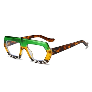 Irregular geometric tricolor sunglasses with green, amber and tortoiseshell thick frames