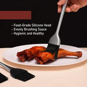 Stainless steel silicone pastry brush for BBQ and baking shown on grilled chicken
