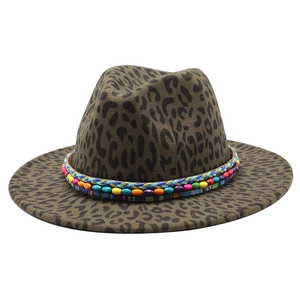 Leopard print fedora hat with colorful hand-woven beaded band on a white background