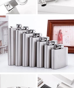 Various sizes of brushed 304 stainless steel hip flasks arranged by size on a table