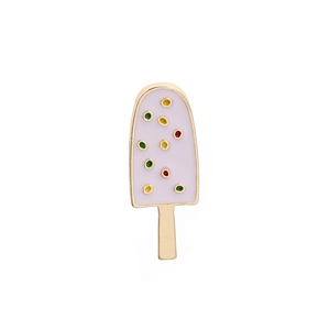 Close-up of a pink enamel ice cream brooch with colorful dots and golden metal finish