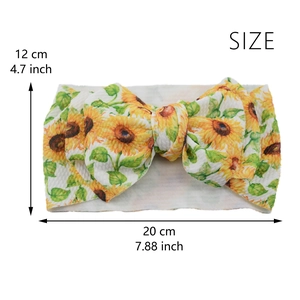Size dimensions showing 20x12 cm of waffle fabric baby headband with sunflower bow