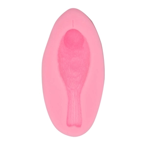 Detailed pink silicone mold showing intricate bird feather textures for fondant and crafts