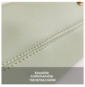 Close-up of light green lychee texture leather bag with reinforced double stitching