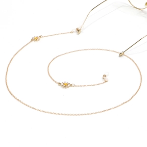 Golden anti-slip eyewear chain with white daisy pendants and adjustable rubber loops