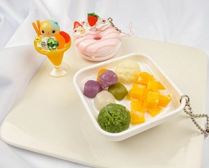 Detail of cute PVC faux dessert charms featuring mango taro ball and sundae designs