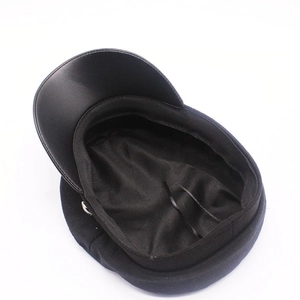 Classic black wool baker boy hat with faux leather brim and adjustable interior ribbon