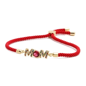 Adjustable red braided rope bracelet with golden MOM charm and colorful zircons