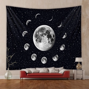 Detail of moon phase tapestry showing full moon cycles over a leather sofa background
