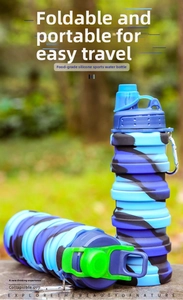 Close-up of food-grade silicone folding water bottle with blue camouflage and carabiner