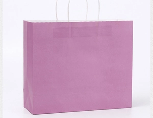 Detail view of purple kraft paper bag with durable white rope handle for retail shopping
