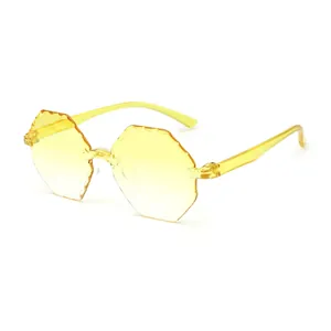 Fashionable jelly yellow rimless polygonal sunglasses with unique scalloped edge lenses