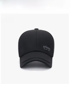 Detail of black baseball cap showing sports lettering and fine twill fabric texture