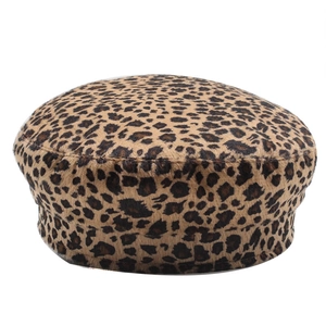 Close-up of leopard print beret featuring soft faux fur texture and vintage pattern detail