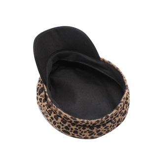 Leopard print newsboy cap with vintage plush fabric and metallic side button detail
