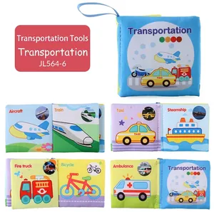 Detail view of baby cloth book with vehicle illustrations and English names