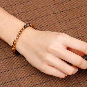 Tiger eye beaded bracelet with rose gold steel beads for women in minimalist style