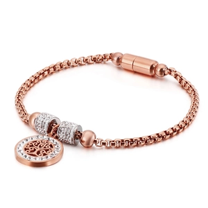 Rose gold tree of life bracelet with crystal rings and a magnetic clasp on white background