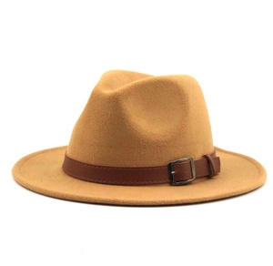 Detail of camel wool fedora hat featuring a brown leather band and silver buckle