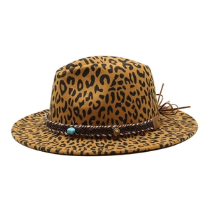 Detail of leopard print fedora with turquoise bead, metal rivet and leather cord trim