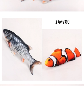 Detail view of realistic plush toy fish including carp and clownfish styles