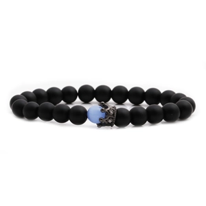 Matte black stone beads bracelet featuring a blue cat-eye stone and black crystal crown