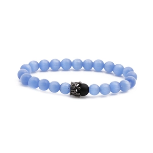 Blue cat eye stone beaded bracelet with silver crown charm on a white background
