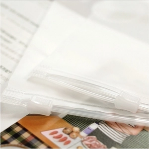 Translucent frosted travel storage bag with slider zipper closure for clothes