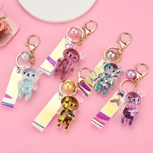 Quicksand acrylic bear keychains with colorful gradient straps in five assorted pastel colors