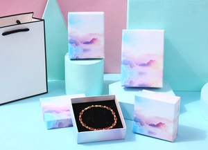 Pink and purple cloud landscape jewelry gift box set with matching white paper carrier bag