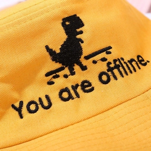 Detail of pixel dinosaur and You are offline embroidery on yellow cotton bucket hat