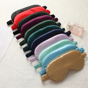 Silky satin sleep masks in multiple colors featuring elastic headbands for travel rest