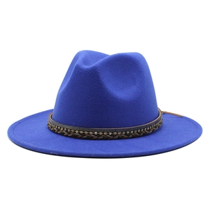 Close-up of blue wool felt jazz hat featuring an intricate rhinestone woven band detail