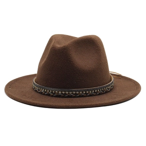 Detail of a brown wool fedora hat featuring an intricate beaded decorative band