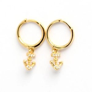 Elegant gold S925 sterling silver hoop earrings with crystal-encrusted anchor charms