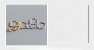 Detail view of S925 sterling silver anchor earrings with dimensions and cubic zirconia inlay