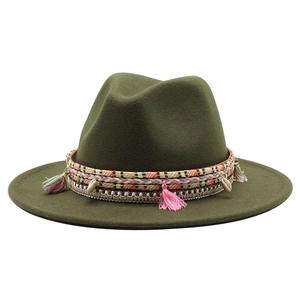 Dark green wool fedora hat with bohemian braided band, pink tassels, and shell charms