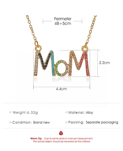 Detailed view of MOM letter pendant with colorful rhinestones on a gold alloy chain