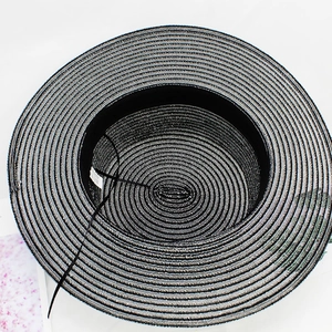 Women's white straw sun hat with silver stripe weaving and a flat top crown