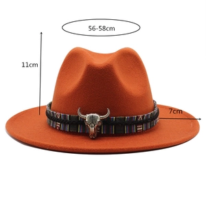 Detail view of orange wool fedora with cattle skull band and 7cm wide brim dimensions