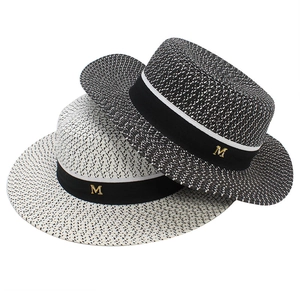 Hepburn style wide brim straw sun hats with black ribbon and golden M metal charm