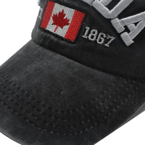 Detail of washed cotton baseball cap with Canada flag embroidery and 1867 patch
